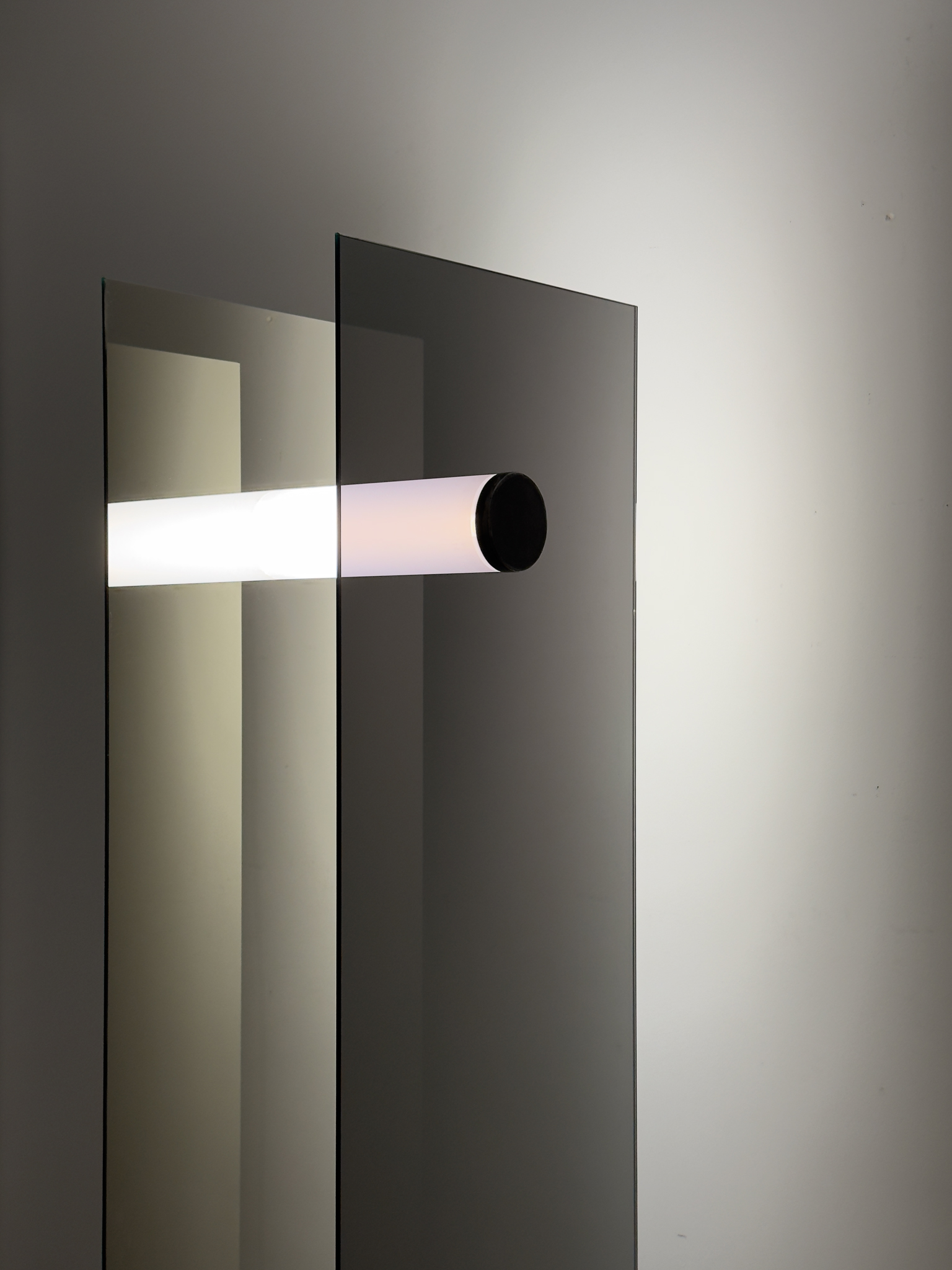'Equation Keyboard' Luminous tube held by two vertical and parallel one-way mirror plates, creating a infinite depth effect.