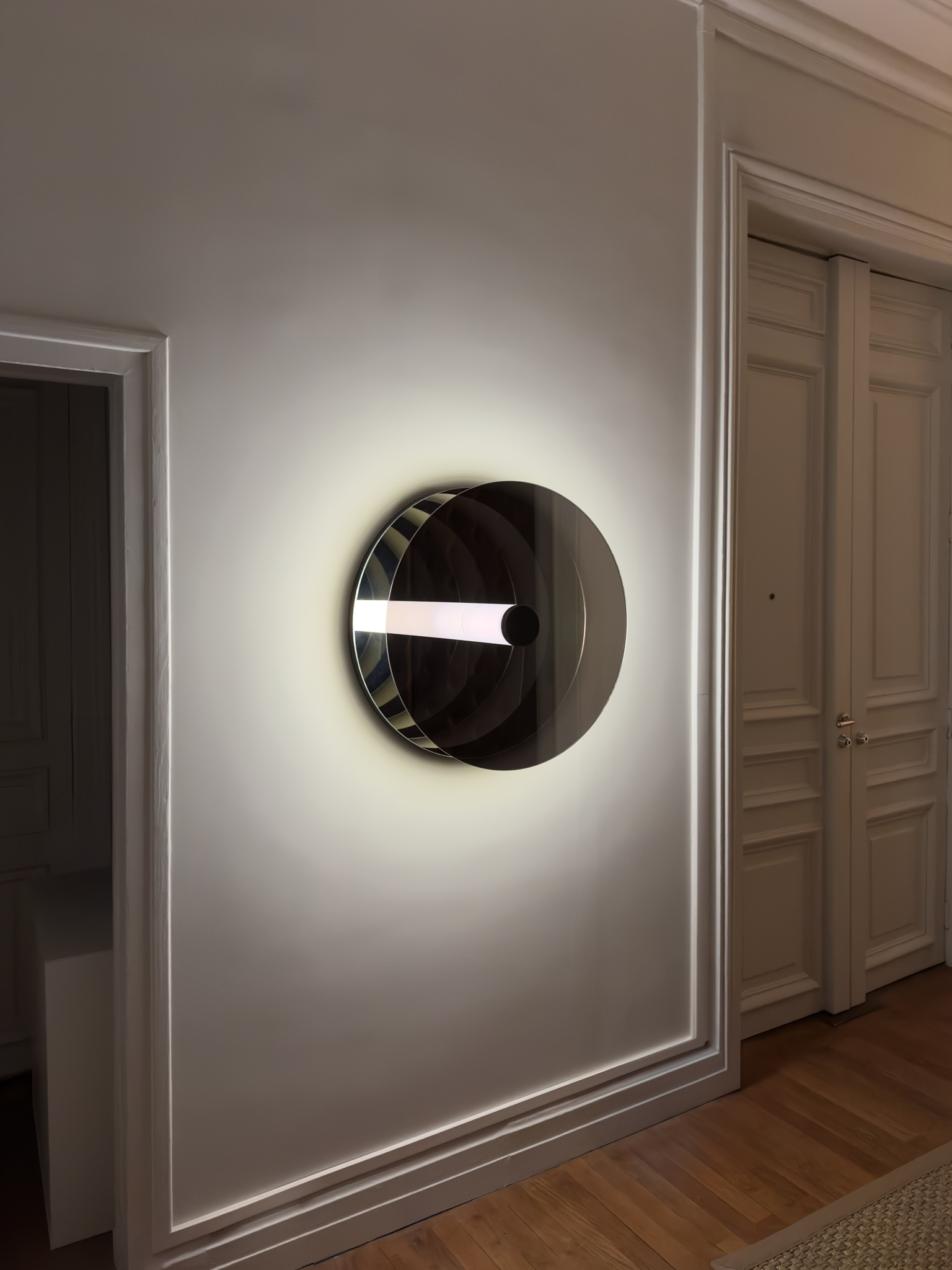 'Paramount Ragtime' is hung on the wall of an entrance hall of a Haussmannian apartment.